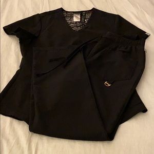 Solid black scrub top and bottoms